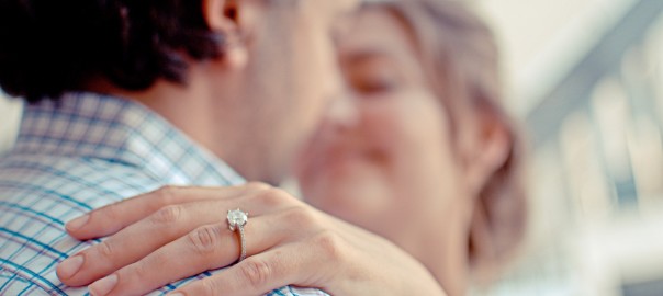 couple with a diamond engagement ring